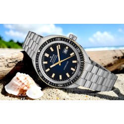 Niebieska tarcza z lumą i certyfikatem chronometru w zegarku Edox 80128-357JNM-BUDD