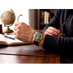 Zegarek Orient Bambino 4 TAC08002F0 z zieloną tarczą na ręku w stylizacji smart casual